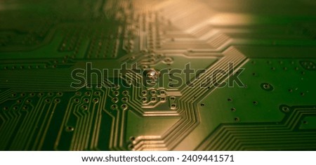 Electronic circuit board closeup. Electronic motherboard card. Circuitry and close-up on electronics. Background of electronics on board electrical circuits, technology texture.