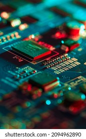 Electronic circuit board with electronic components such as chips close up. Blurry background.	 - Shutterstock ID 2094962890