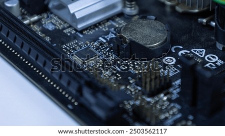 Electronic circuit board computer on white background. Smartphone tablet computer components. Electronics service and repair concept.
