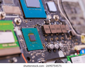 Electronic circuit board with microchips, processors, RAM modules, and other components, representing modern technology and computing - Powered by Shutterstock - Get 15% off with code: PIKWIZARD15