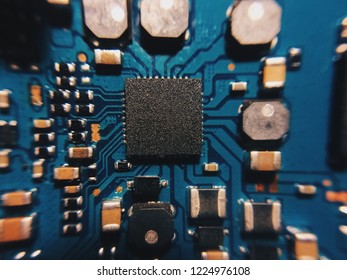 Electronic circuit board with processor, close up.