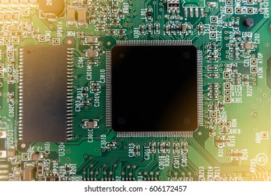 Electronic circuit board with processor, close up.
