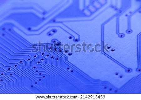 Electronic circuit, computer circuit board blue, computer technology.  Abstract technology microelectronics concept background. Macro shot, selective focus, extremely shallow DOF