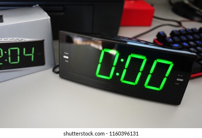 Electronic clock with large display and built-in radio.