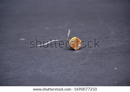 Electronic component called LDR (Light Dependent Resistor). The light-sensitive electronic component is often used or applied in the electronic circuit as a light sensor