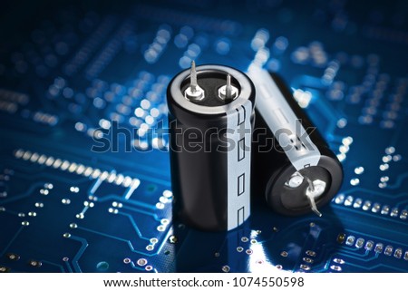 Electronic component capacitor on the blue printed circuit board