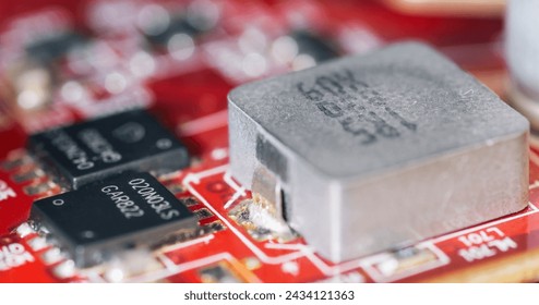 Electronic components, chips and capacitors on the blue pcb, close up view. Technology concept