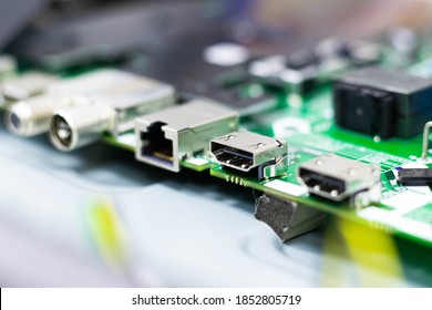 Electronic components. Focus in the HDMI connector. Blur background. Electronic circuit board close up.