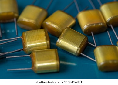 Electronic Components, Lots Of Polyester Film Capacitors On PCB Background