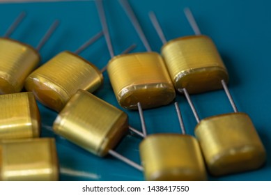 Electronic Components, Lots Of Polyester Film Capacitors On PCB Background