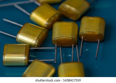 Electronic Components, Lots Of Polyester Film Capacitors On PCB Background