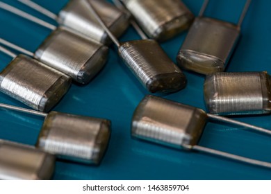 Electronic Components, Lots Of Polyester Film Capacitors On PCB Background