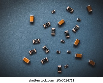 Electronic Components, Many Ceramic Capacitors And Chip Resistors On PCB Background