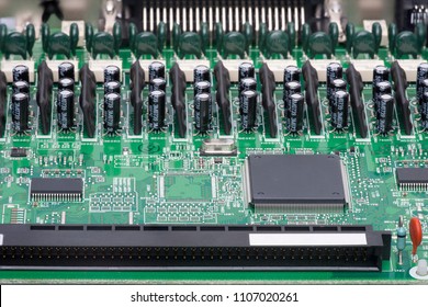 Electronic components are mounted on the device board Chips diodes capacitors chokes Close-up