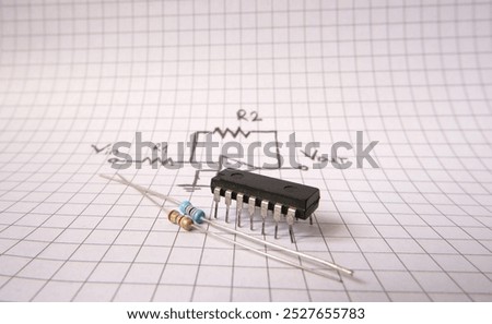 Electronic components on acircuit drawing. Industrial projects or engineering education concept. Operational amplifier. 