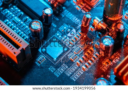Electronic components on a printed circuit board. Resistor, inductor and capacitor on PCB. Concept Electrical engineering, microprocessor, technology. Selective focus