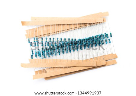 Electronic components: resistors on paper tape isolated on white 
