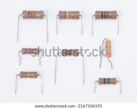 Electronic components - resistors on white background. Color bar code.