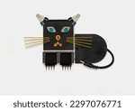Electronic components in the shape of a cute cat. White background.