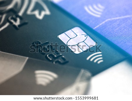 Electronic contactless credit card with selective focus microchip. Macro of a credit card.