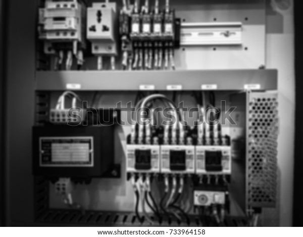 Electronic Control\
Cabinet background\
blur