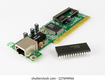 Electronic device pcb and digital chip isolated on white background. Printed circuit board