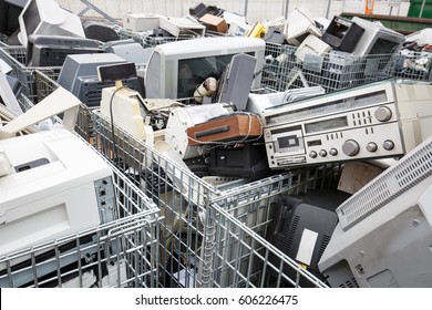 Electronic Devices Dump Site. E-waste Disposal, Management, Reuse, Recycle And Recovery Concept. Electronic Consumerism, Globalization, Raw Material Source Concept. 
