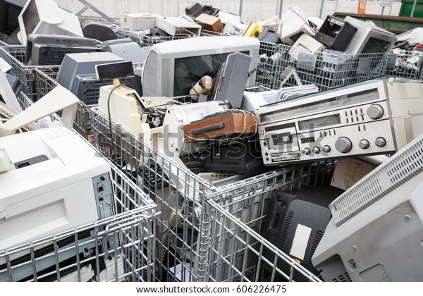 Electronic devices dump site.\
E-waste disposal, management, reuse, recycle and recovery concept.\
Electronic consumerism, globalization, raw material source concept.\
\
