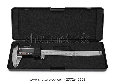 Electronic digital caliper in plasic box on white background 