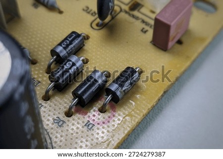 Electronic diode components soldered on pcb for bridge rectifier circuit