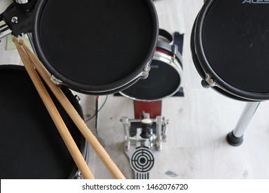 Electronic Drum Kit And Drum Sticks.