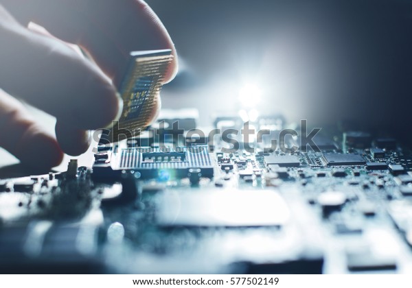 Electronic engineer of computer
technology. Maintenance computer cpu hardware upgrade of
motherboard component. Pc repair, technician and industry support
concept.