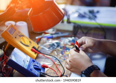 Electronic equipment measurement by skilled technicians. - Powered by Shutterstock