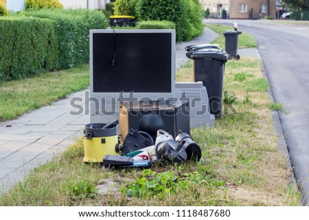 Similar – Image, Stock Photo Bulky waste pile with old furniture and household goods in front of a block of flats