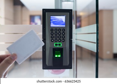 electronic key and finger scan access control system to lock and unlock doors - Shutterstock ID 636623425
