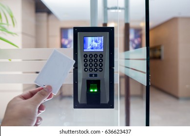 electronic key and finger scan access control system to lock and unlock doors - Shutterstock ID 636623437
