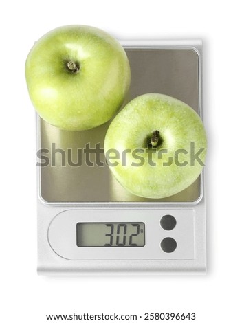Electronic kitchen scale with apples isolated on white, top view