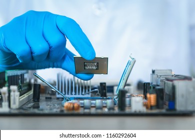 Electronic Lab Science and Manufacturing Computer Processor Concept, Engineer CPU Microchip Development Holding Circuit CPU for Examination Damage in Laboratory. Engineering Microprocessor Motherboard
