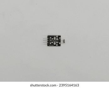 Electronic LDR sensor module isolated in white background - Shutterstock ID 2395164163