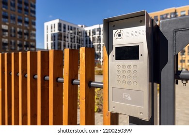 Electronic lock with buttons and intercom on the fence gate, safety device. - Shutterstock ID 2200250399