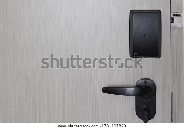 Electronic lock on door\
with black key card.