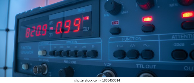 Electronic measuring instrument. Function generator and  Multimeter Instrument for measuring voltage - Powered by Shutterstock