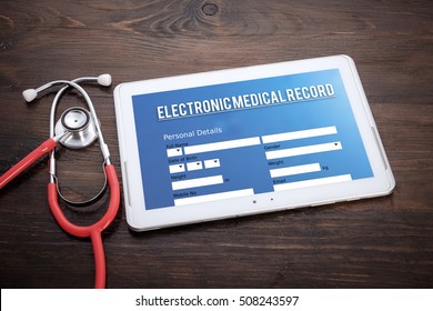 Electronic Medical Record Form On Screen Tablet Pc, Health Concept. Information Technology And Mobile Application In Healthcare/medical.