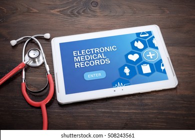 Electronic Medical Records On Screen Tablet Pc, Health Concept. Information Technology And Mobile Application In Healthcare/medical.