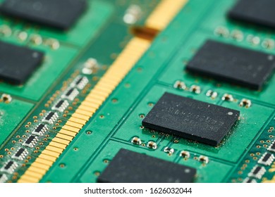 Electronic microcircuit with microchips and capacitors taken closeup