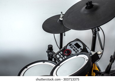 Electronic Modern Drum Kits Set In A Small Music Room With White Wall