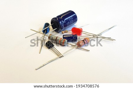 Electronic passive components isolated on white background - resistors, capacitors, transistors, diodes