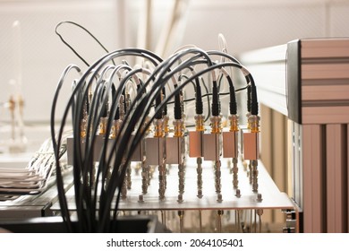 Electronic Signal Processing Devices In A Science Lab. Many Connected Cables In Sockets. Organised, Tidy Not Messy. Close Up Shot, No People.