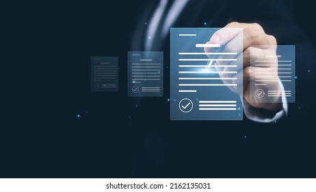 Electronic signature concept, business people sign electronic documents on digital documents, paperless office, future business contract signing. - Shutterstock ID 2162135031