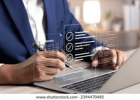 Electronic signature concept, E-signing, Business man using stylus pen signing contract electronic document on laptop, Document management, Sign agreement, E-documents for paperless transactions.